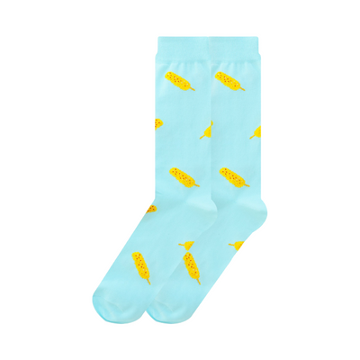 Pair of aqua socks with images of corn on a stick