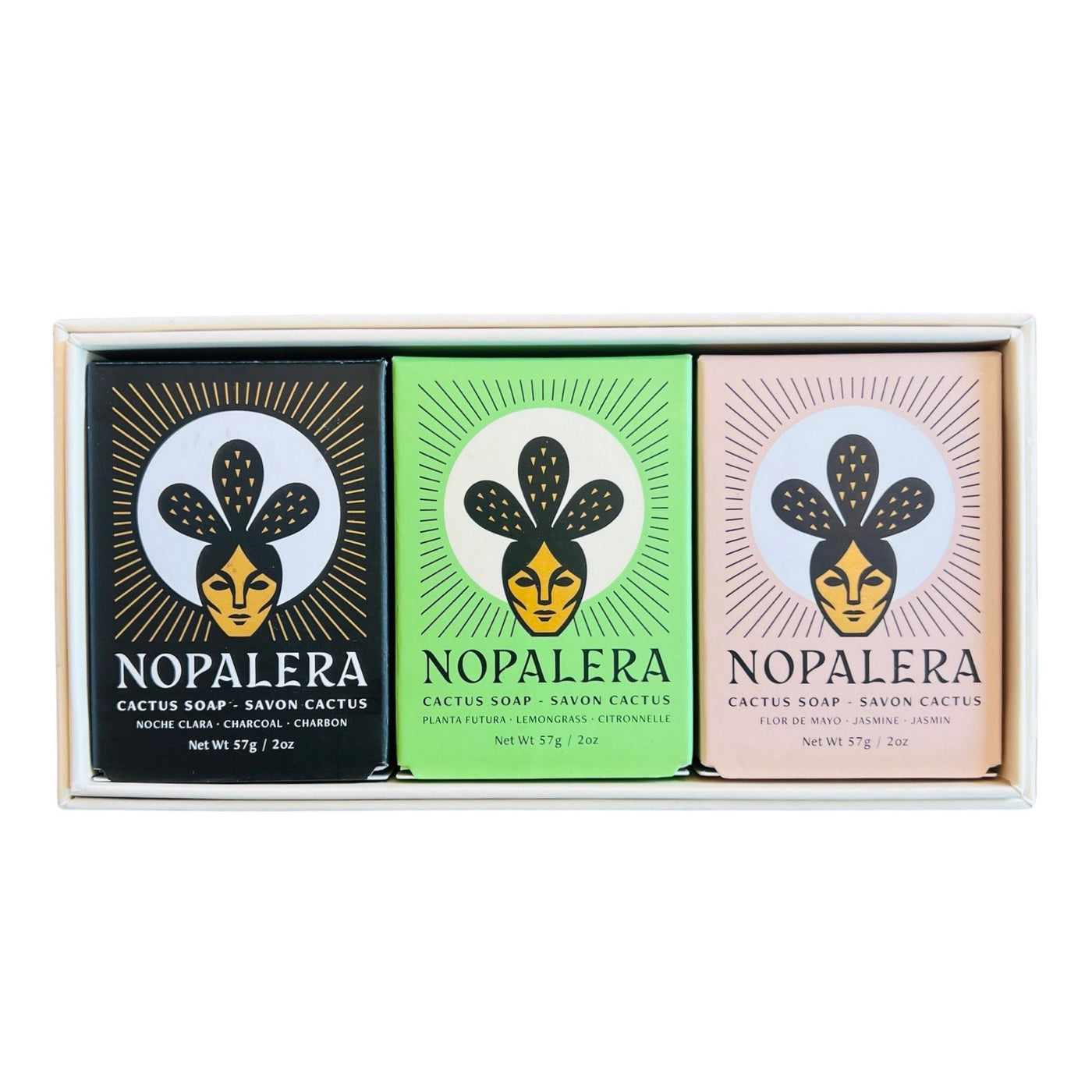 Three 2oz nopalera soaps in green, black and lavender packaging