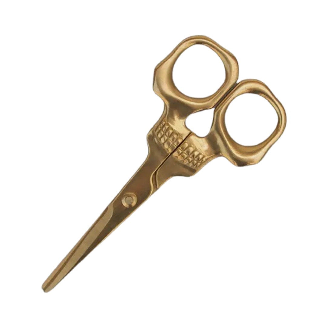 brass scissors shaped as a skull