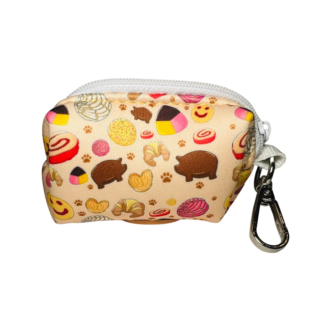 light yellow dog poop dispenser bag with images of pan dulce.