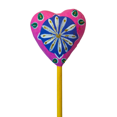 pink heart shaker with a colorful floral design with glitter accents