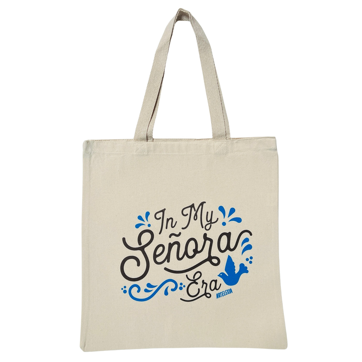 Natural tote bag with the phrase In My Señora Era in brown lettering featuring a blue bird and filagree design.