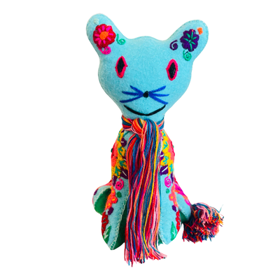 front view of an embroidered teal cat with colorful flowers