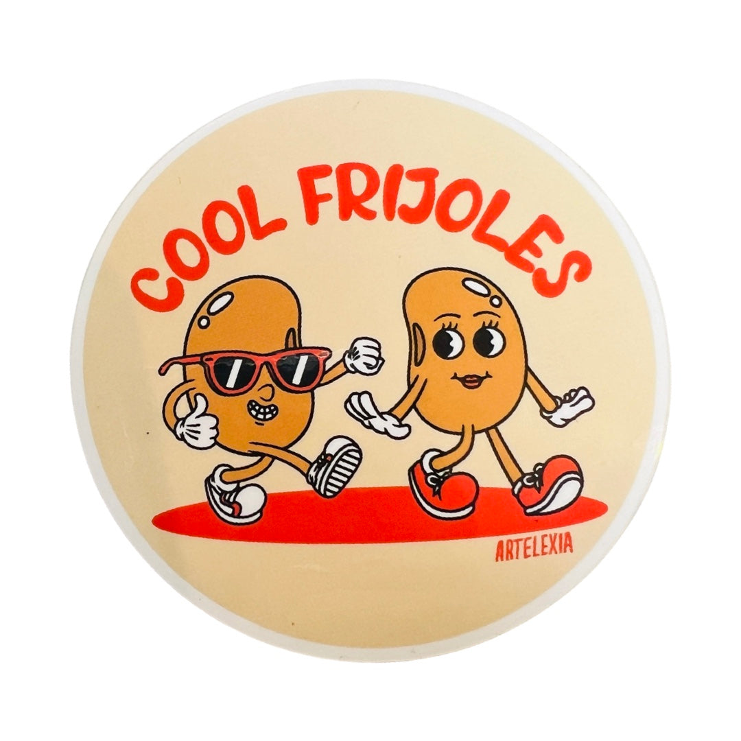Beige round sticker with a pair of cartoon beans walking and the phrase Cool Frijoles above them in red lettering