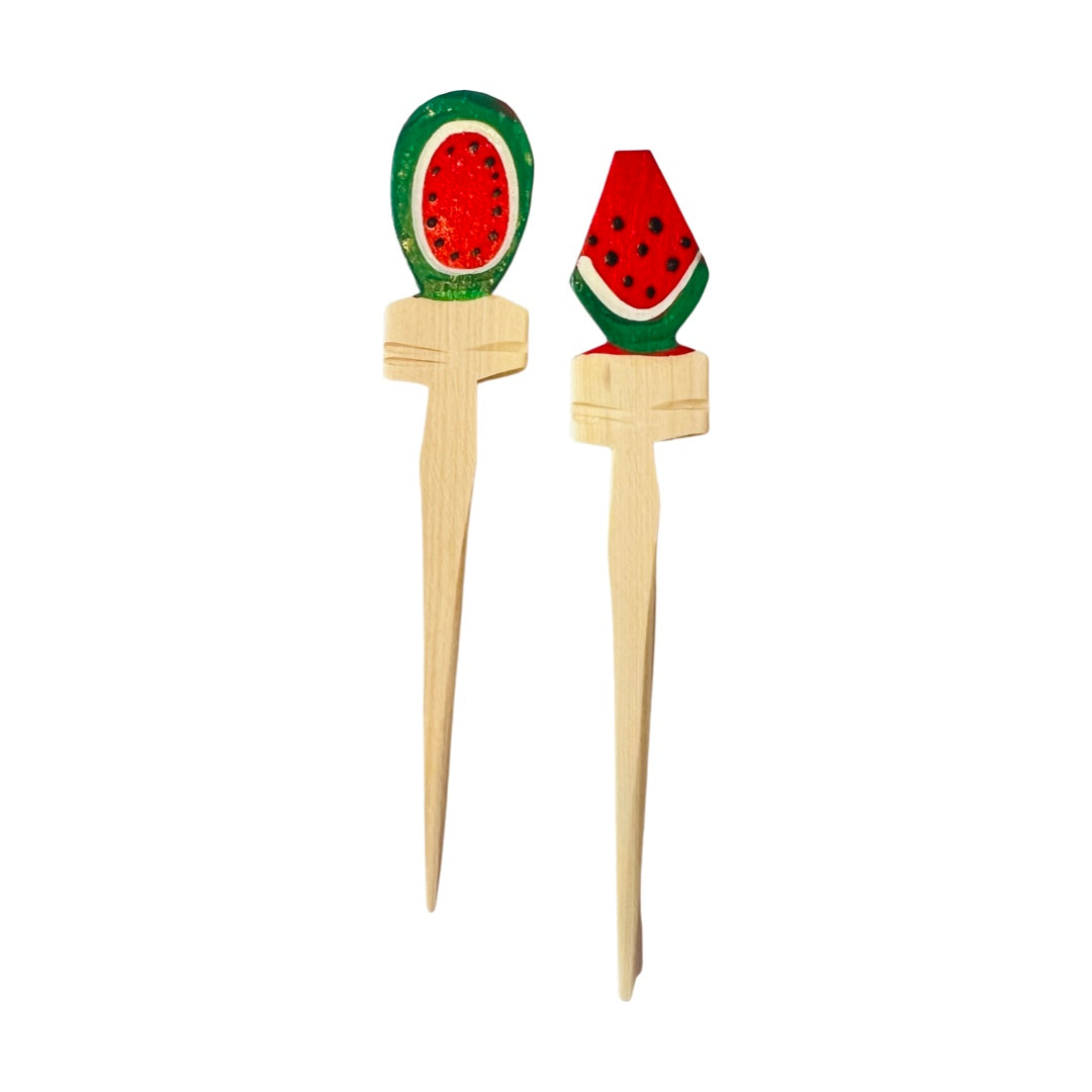 set of wooden toothpicks with a watermelon design painted on the top