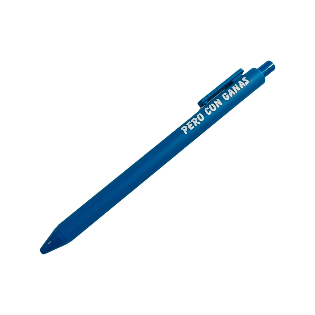 Blue pen with the phrase Pero Con Ganas in white lettering