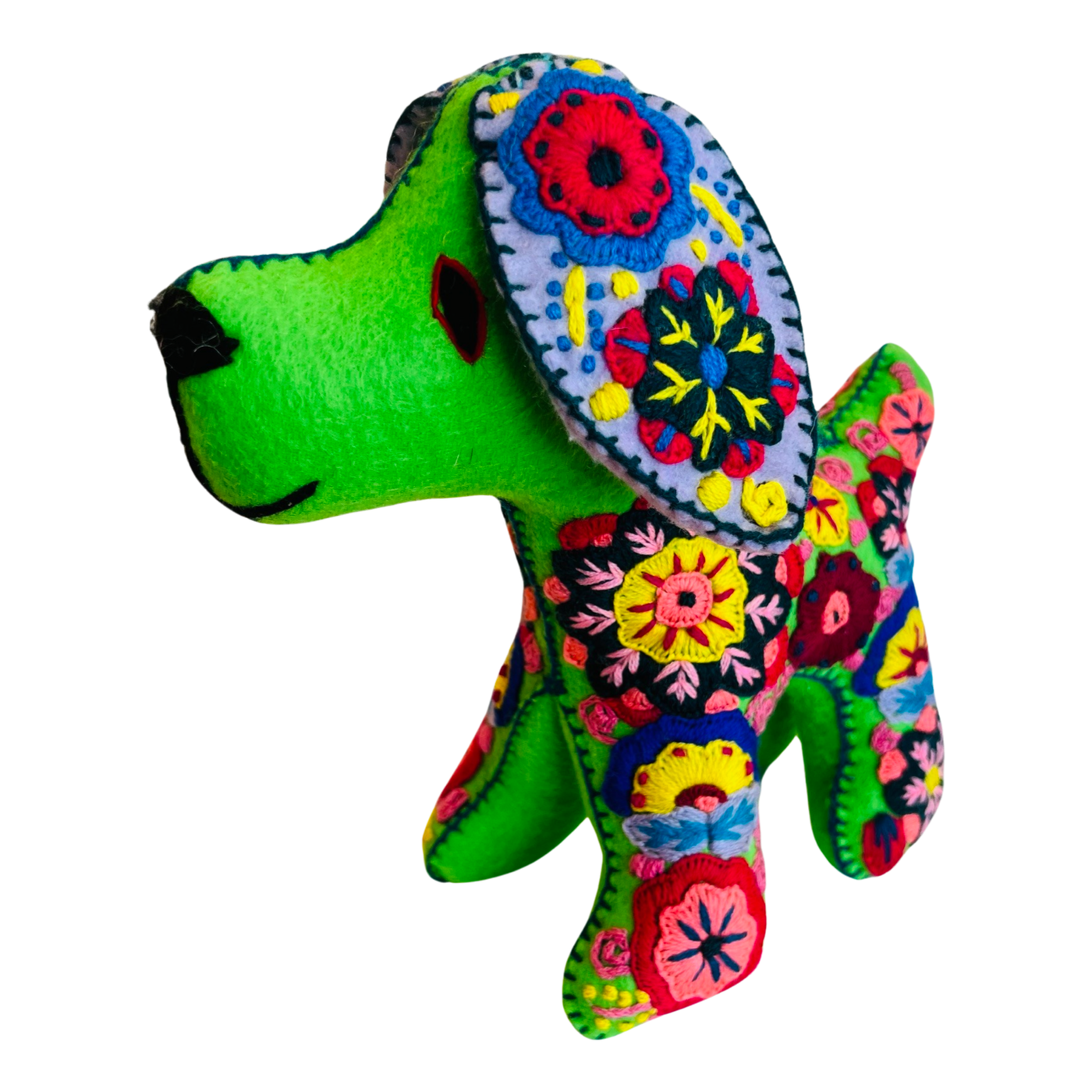 side view of an embroidered green dog with colorful flowers