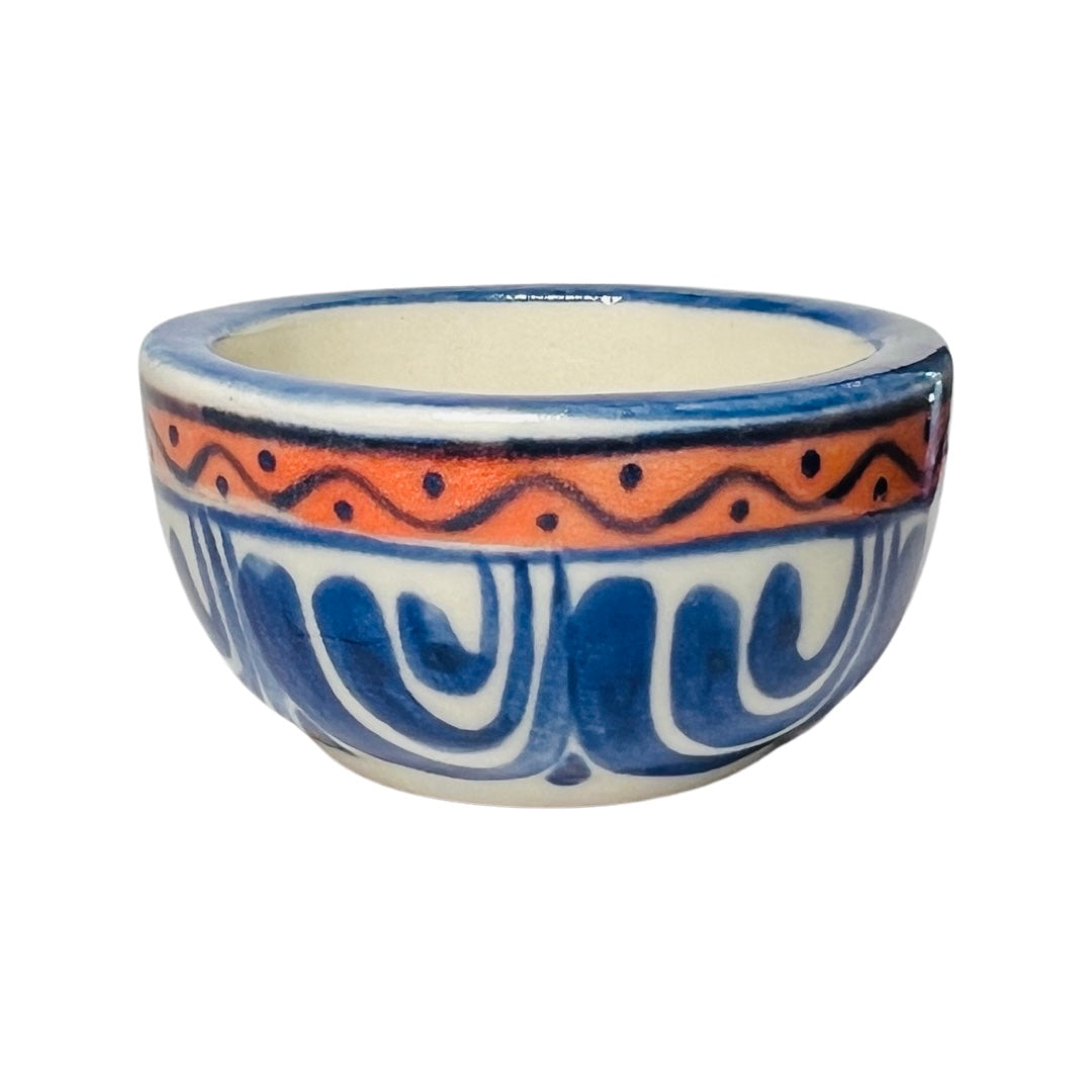 Blue, cream and orange stoneware bowl with a blue design