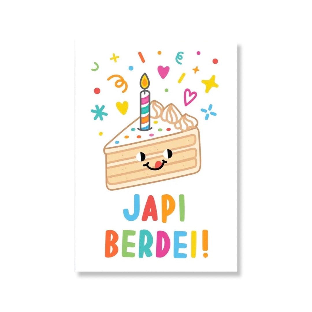 White card with a smiley and colorful slice of cake and candle with the phrase Japi Berdei. Translation: Happy Bday