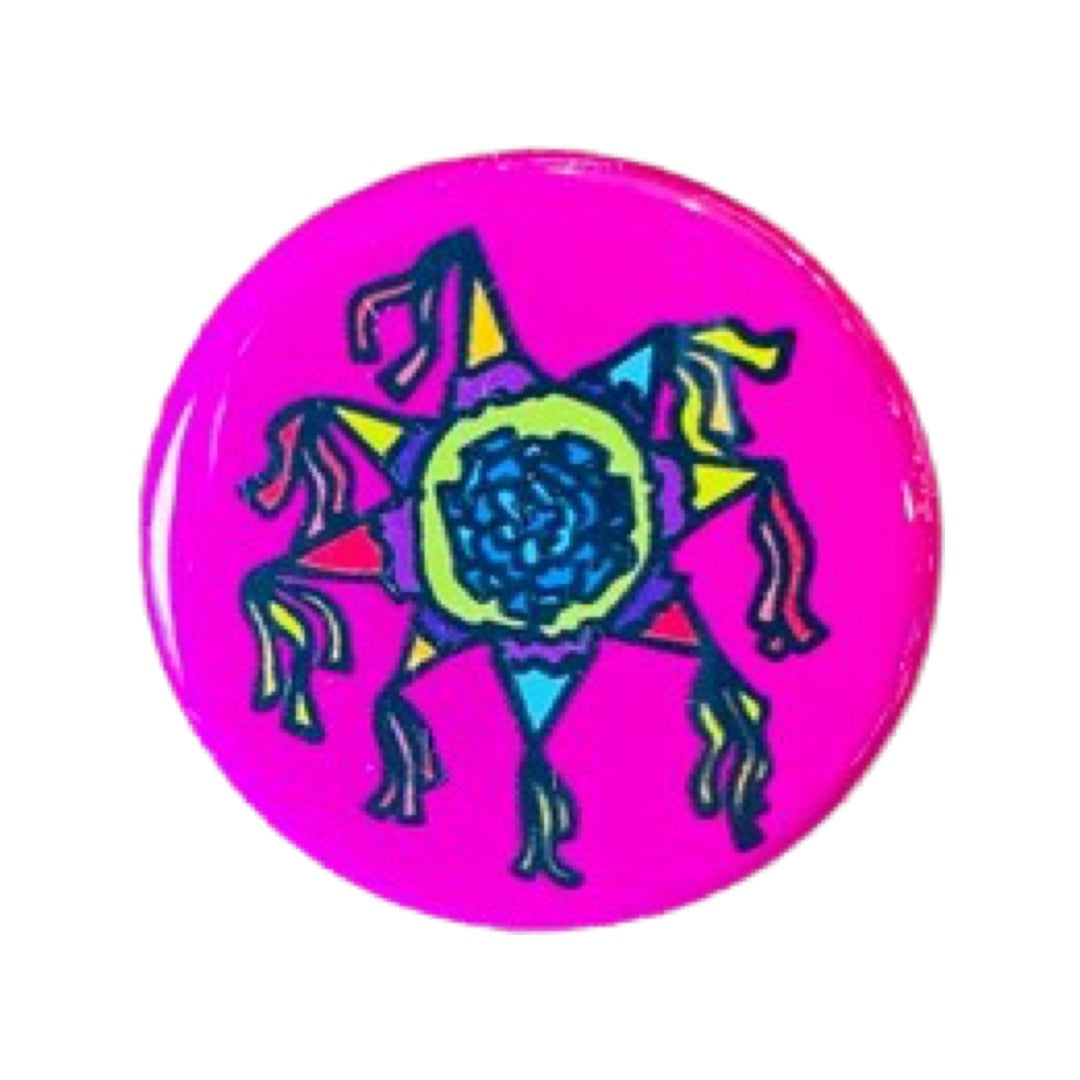 Pink round pin button with a star pinata