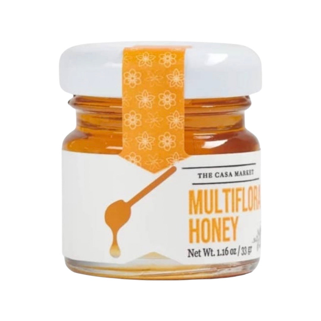 Mini Multiflora Honey in branded glass jar with lid.