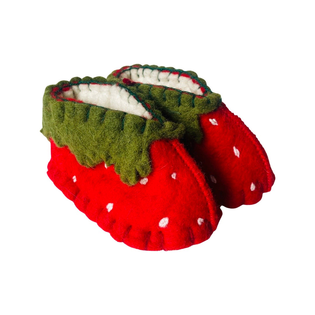 Wool booties in red with white dots and green leaves.