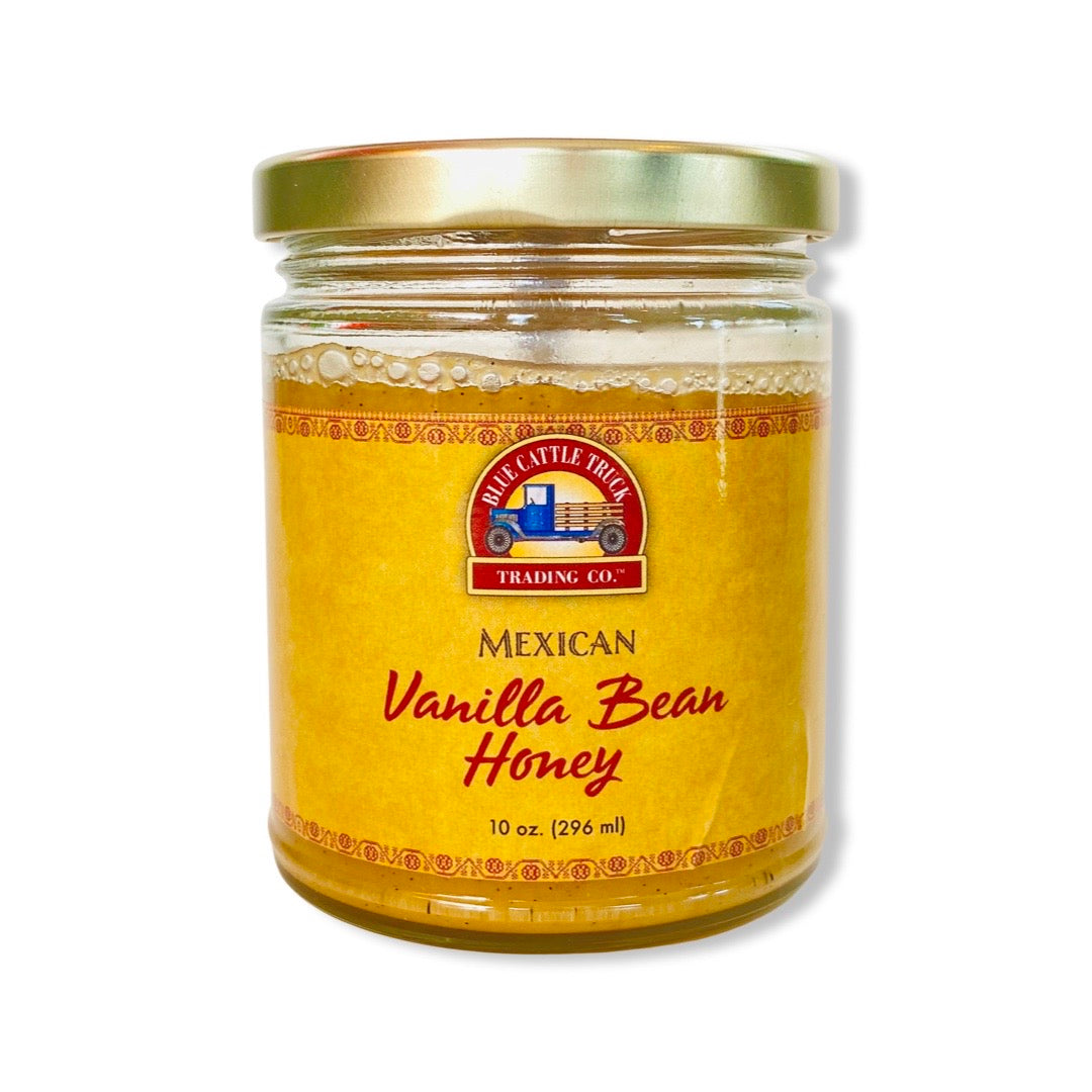 front view of Mexican Vanilla Bean Honey in branded jar with lid.