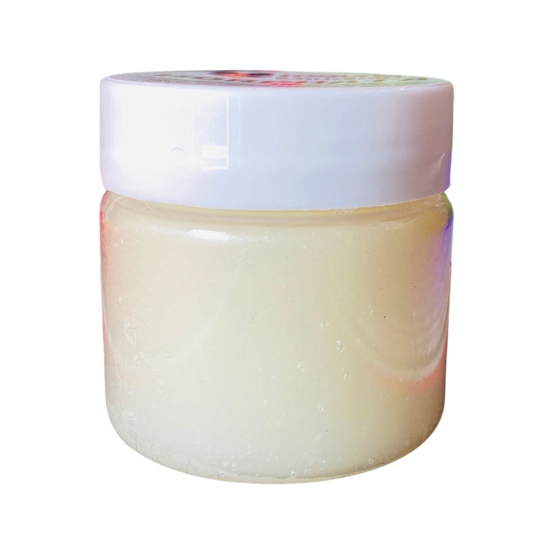 Side view of horchata (sweet rice water) lip scrub jar with lid.
