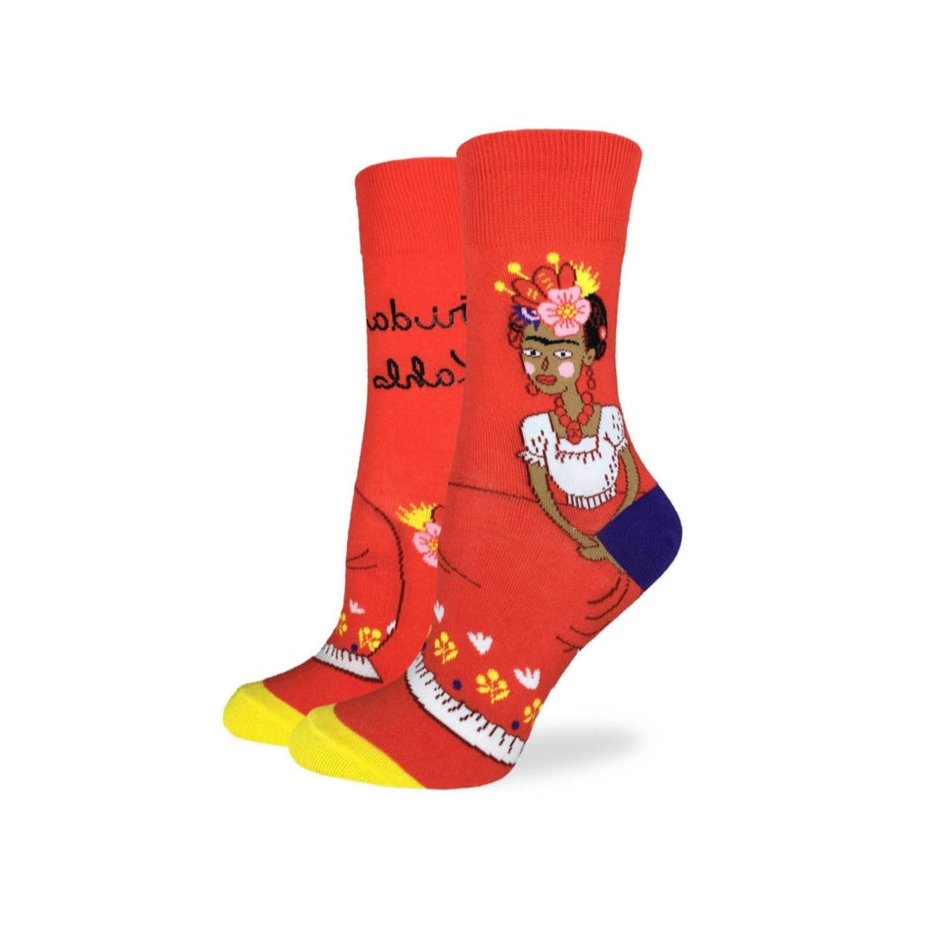 Women's red Frida Kahlo socks with yellow accents. Design features Frida Kahlo graphic with phrase.