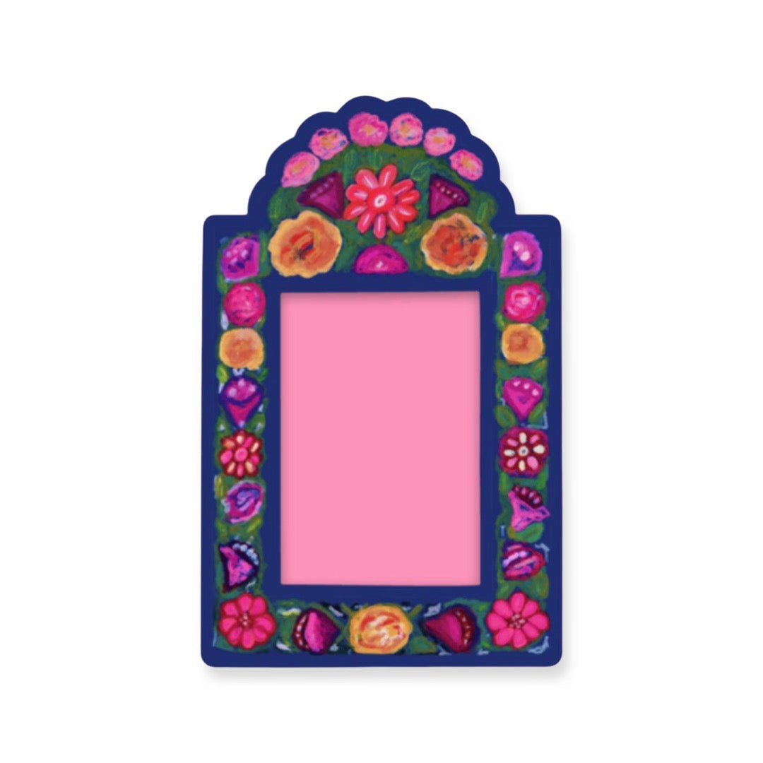 Sticker of a frame with an arch on top and features a border of various flowers.