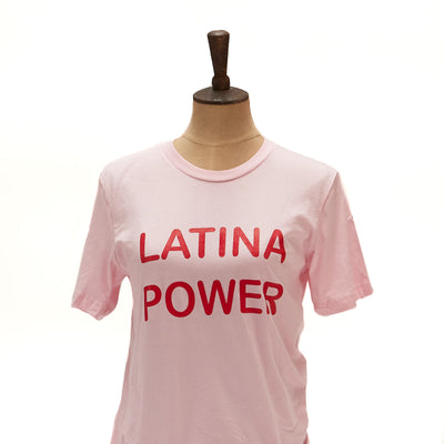 Pink, "Latina Power" phrase t-shirt with red detail pictured on mannequin. 