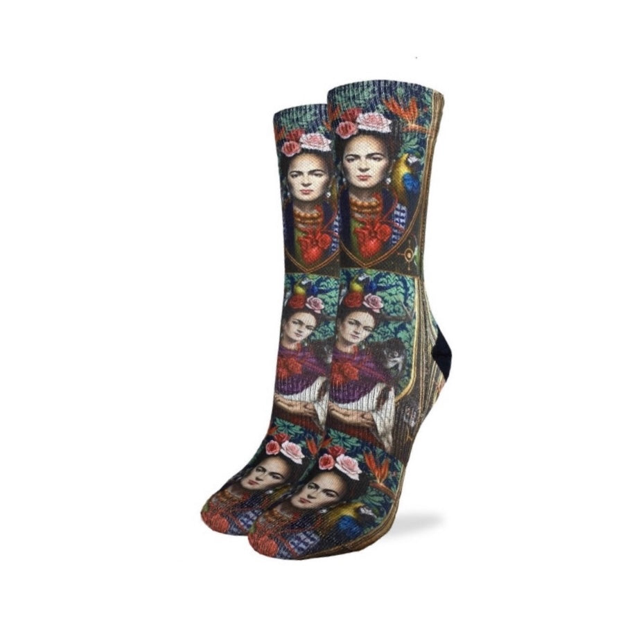 Women's mid calf Ode to Frida socks. Design features colorful portraits of Frida.