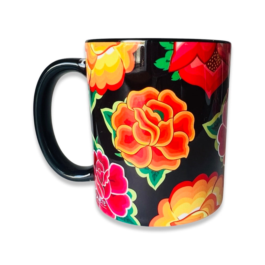 Tehuana mug features brightly colored flowers with black background.