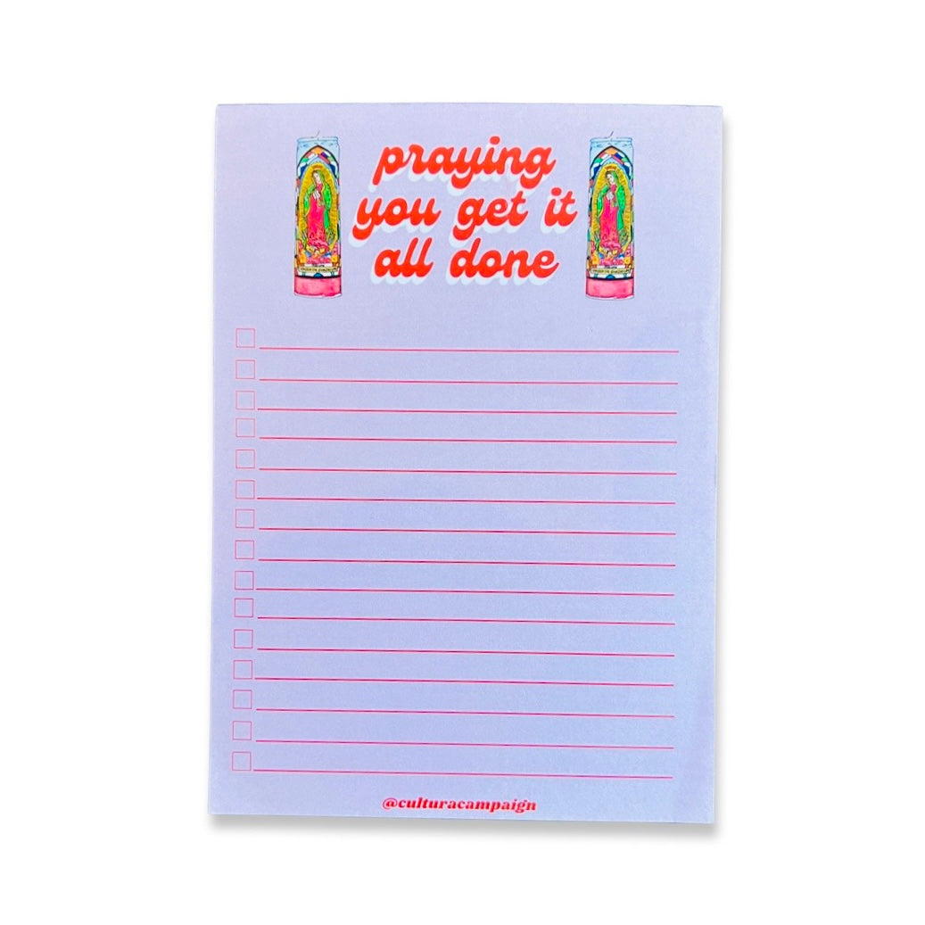 Praying You Get It Done notepad. Design features Virgen de Guadalupe candles.