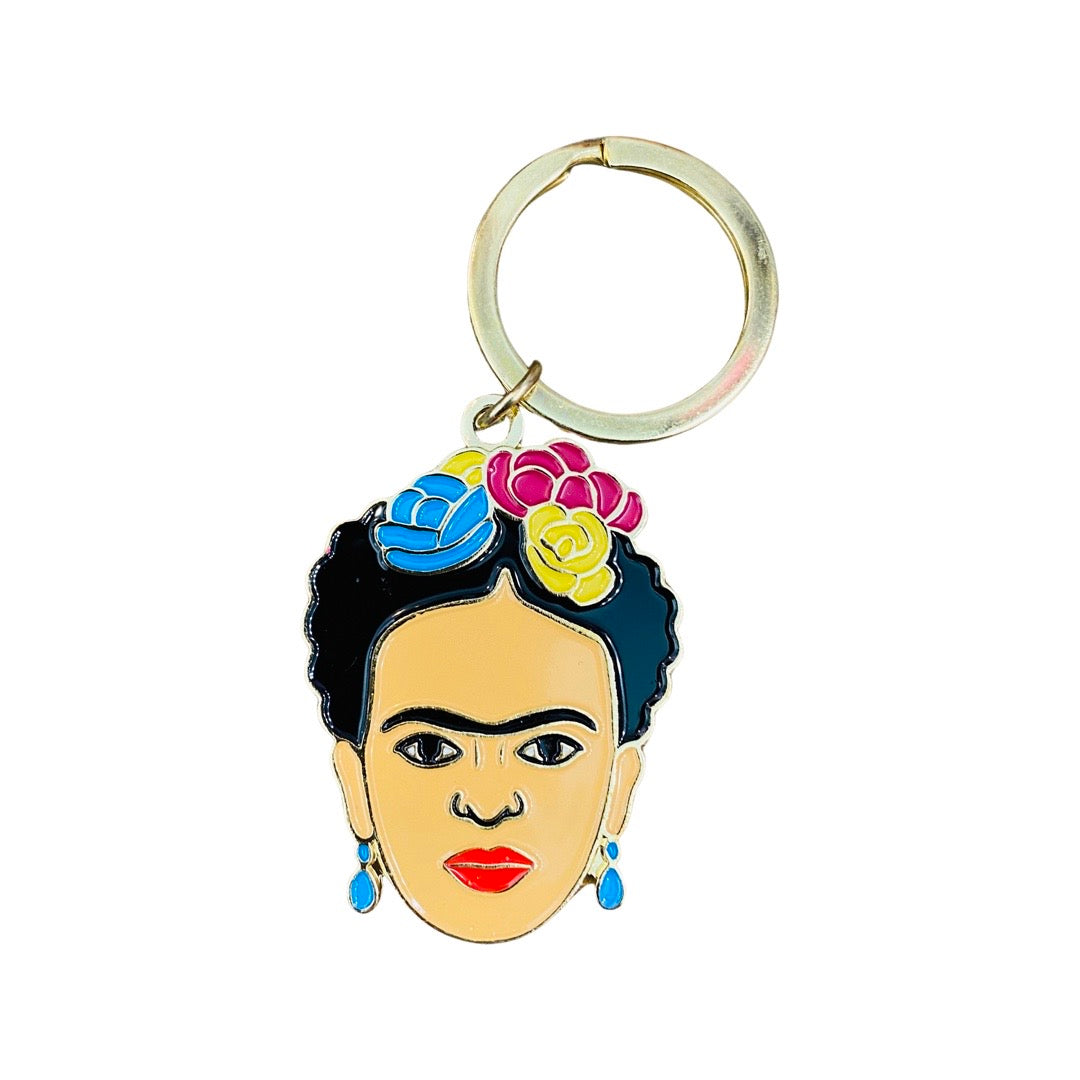Frida Kahlo key chain with gold metal key ring. Frida wears a colorful flower crown.