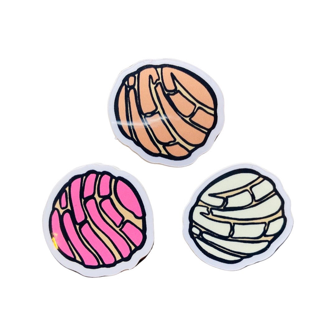 Mini concha stickers in pink, brown, and cream.