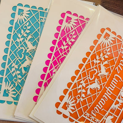 Feliz Cumpleanos papel picado birthday cards in turquoise, pink, and orange.