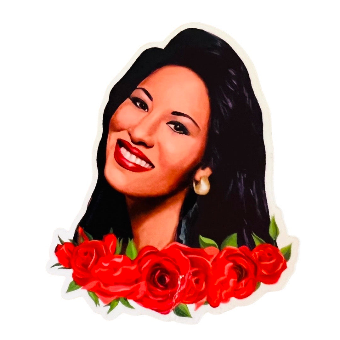 A sticker of Texan singer Selena from the neck up with 7 red roses on the bottom.