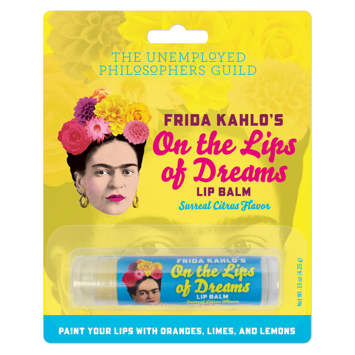 Frida Kahlo's On the Lips of Dreams lip balm in branded packaging. Lip balm is citrus flavored. Lip balm stick features Frida Kahlo wearing a flower crown. 