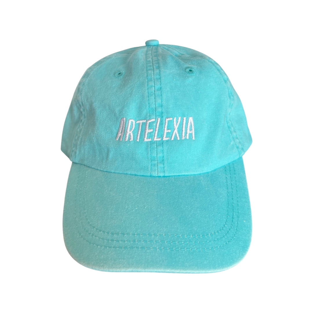 Aqua hat with the word Artelexia in white lettering