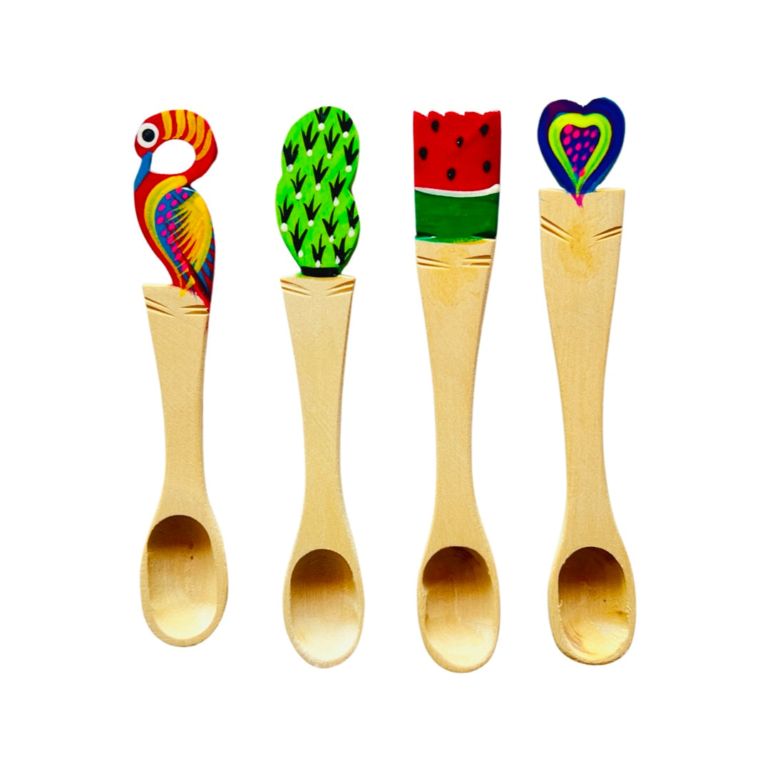 Colorful Oaxacan Painted Wooden Spoons. From left to right design features: bird, cactus, watermelon, and heart. 