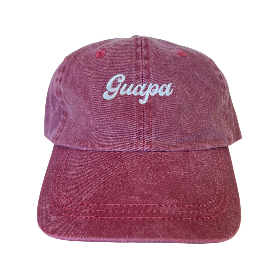 WIne colored dad hat with the word Guapa in white lettering