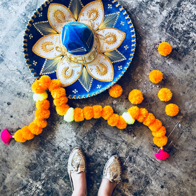 DIY with The Neon Tea Party: Mexican Marigold Pom Pom Garland How-To