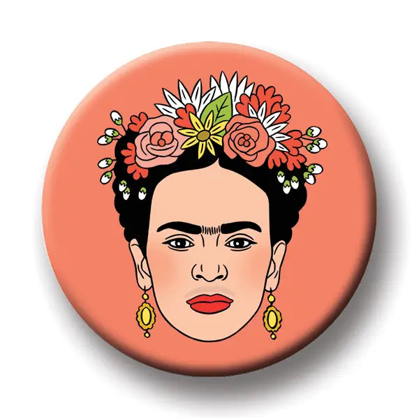 Round peach colored magnet with an image of Frida Kahlo