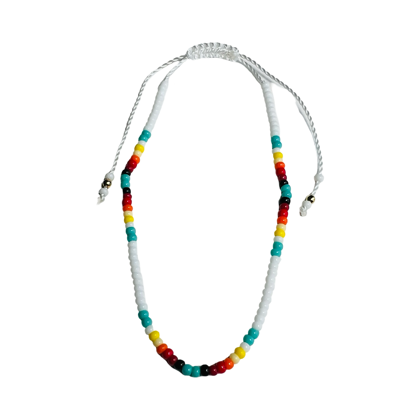 Vibrant Mexican bead bracelet featuring turquoise, red, black, yellow and white beads.