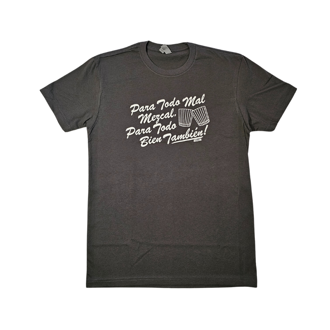 dark grey tee shirt with white text on front reading "Para Todo Mal Mezcal, Para Todo Bien También" in script lettering