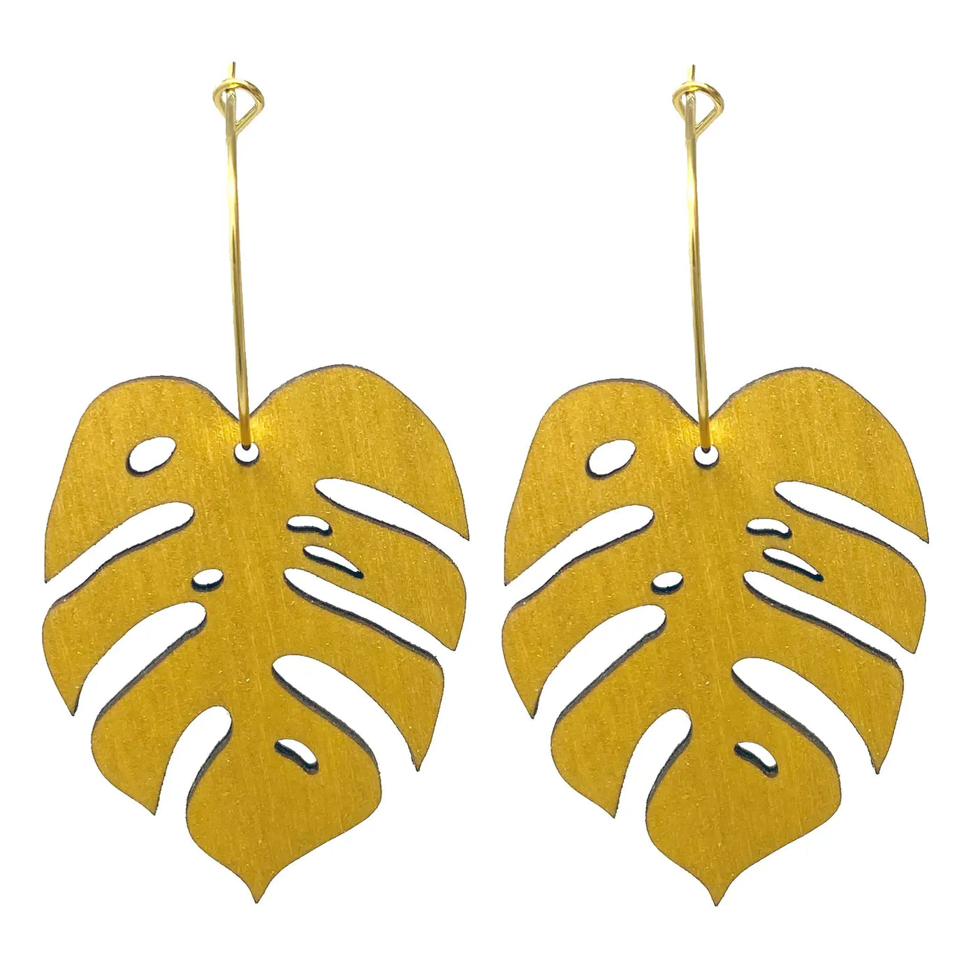 Pair of laser cut gold monstera leaf earrings