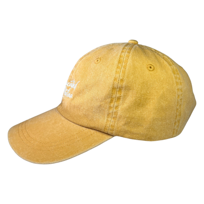 side view of a yellow hat with the phrase Educated Latina in white lettering