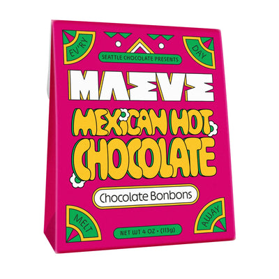 A 4oz box of Maeve Mexican Hot Chocolate Bonbons by Seattle Chocolate, featuring a bold pink and yellow design with playful typography and geometric patterns. 