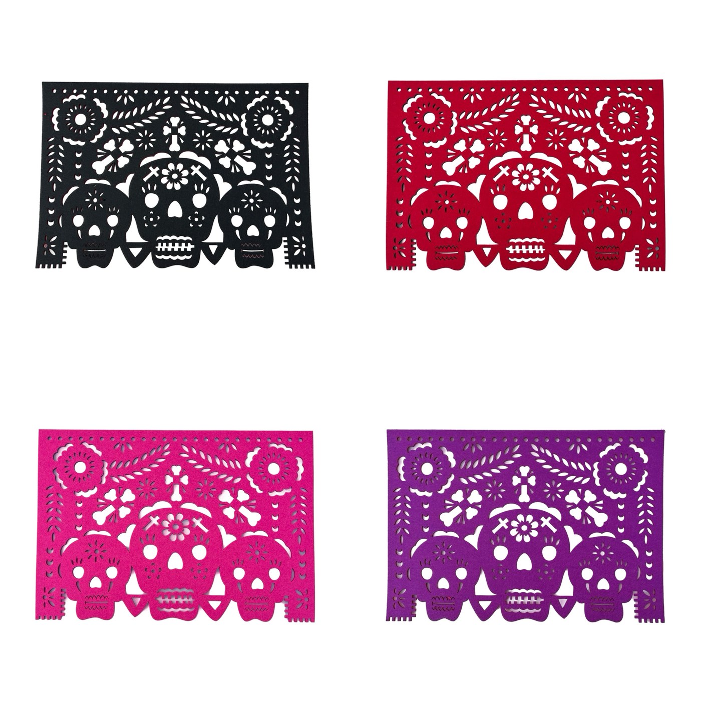 4 mutlicolored felt papel picado inspired placemats that features a trio of skulls design with flowers and bone crosses.