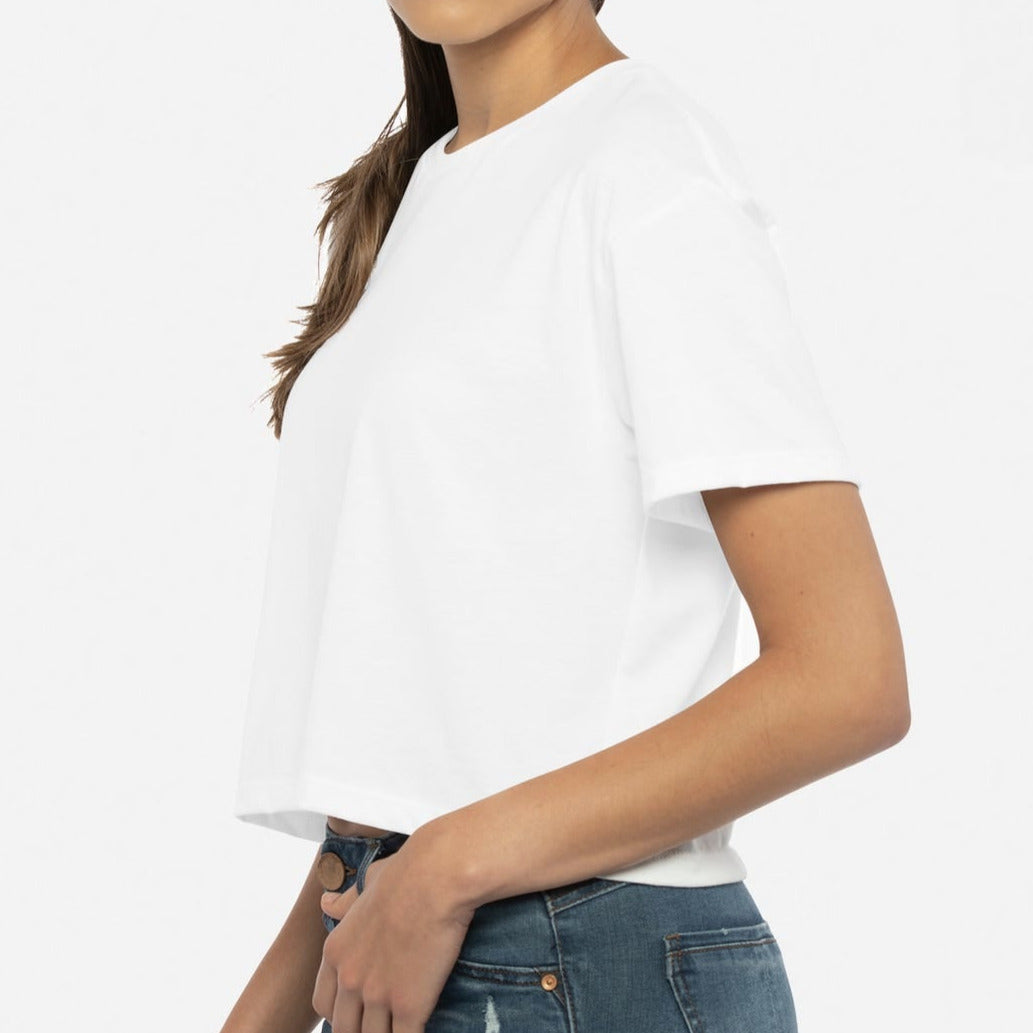 image of a women's torso wearing a white croptop