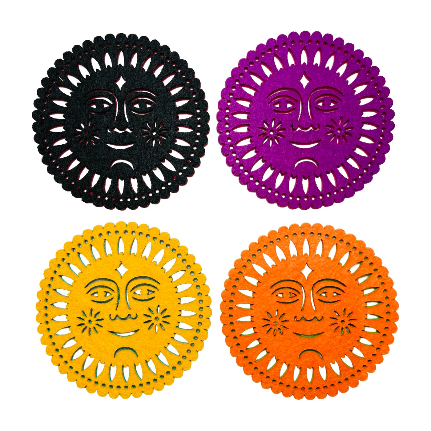 set of 4 round multicolored felt papel picado inspired coasters that feature a sun design