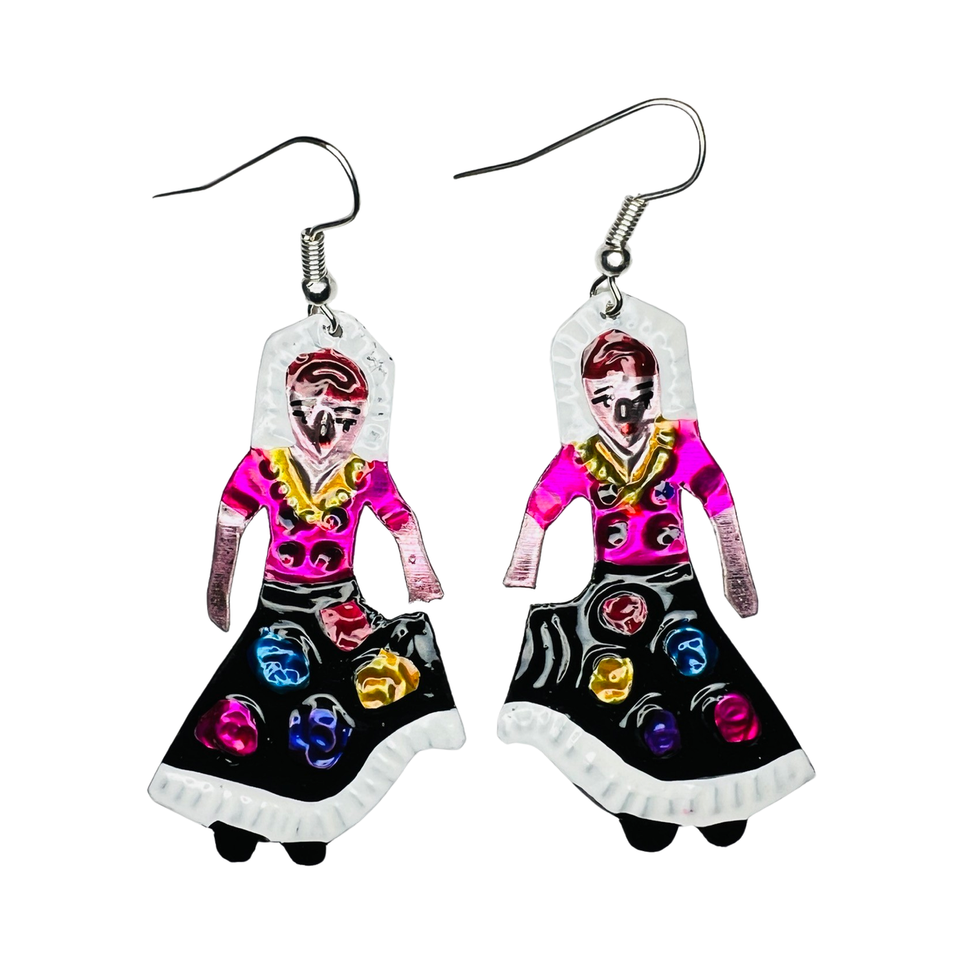 set of tin earrings featuring a woman in traditional Oaxacan attire.