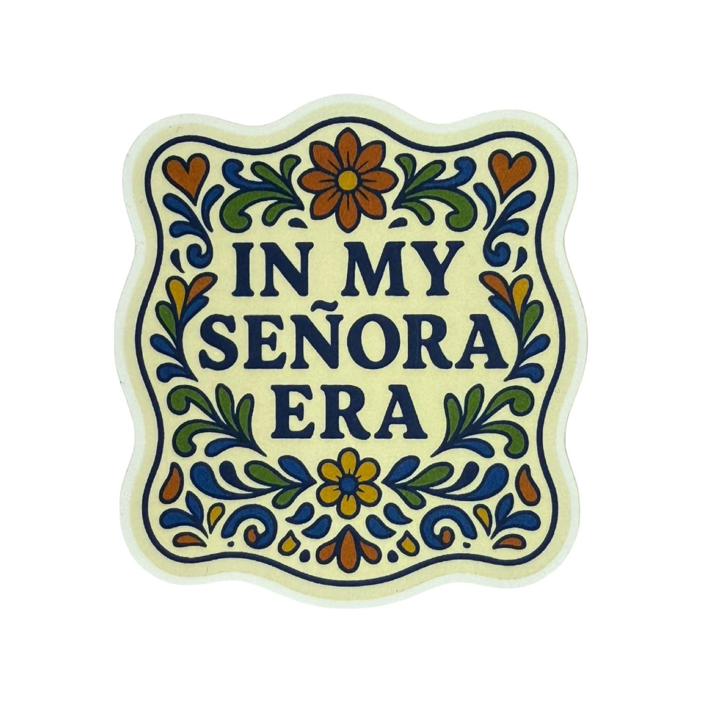 Sticker with the phrase “In My Señora Era” in bold navy text, surrounded by a decorative floral border in blue, orange, and green.