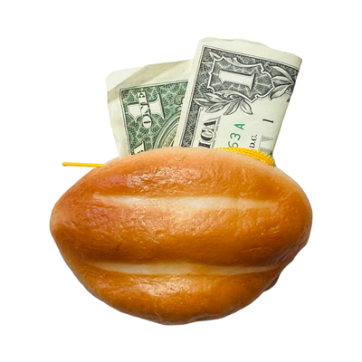 telera bread shaped rubber coin pouch with a dollar