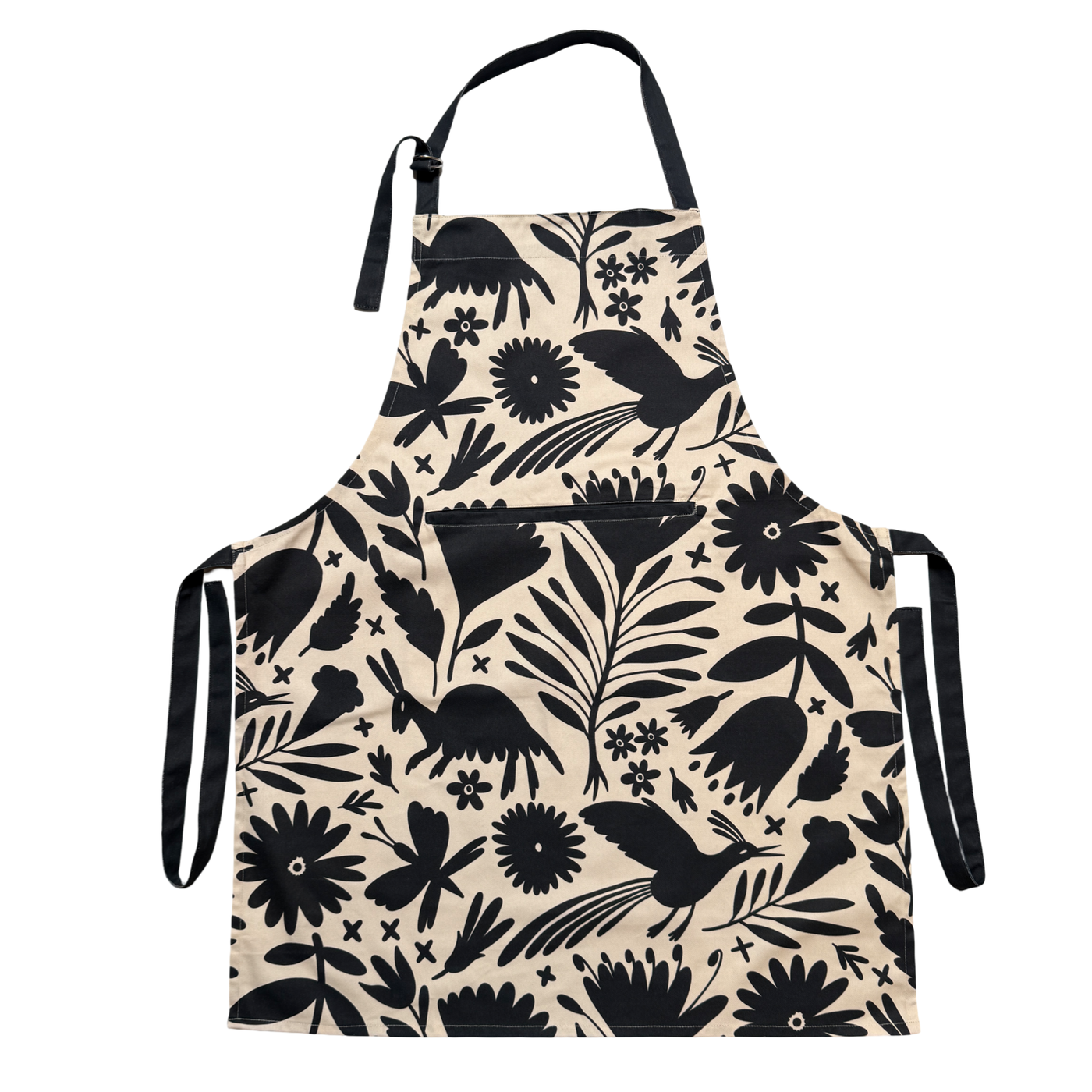 Beige apron with black floral and bird otomi pattern
