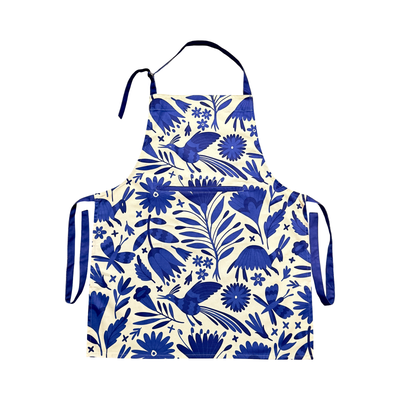 Apron featuring a blue Mexican otomi design with front pocket, blue neck and waist ties.