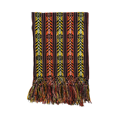 Colorful woven Cambaya table runner from Mexico, featuring intricate geometric patterns in yellow, orange, and black with multicolored fringed ends.