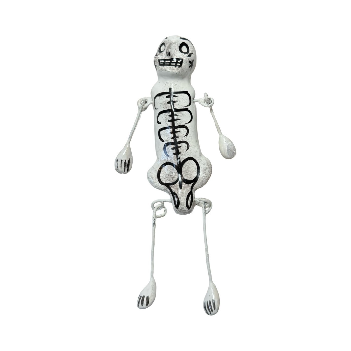 White ceramic skeleton ornament with hand-painted black details, featuring movable arms and legs.