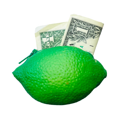 green lime shaped rubber coin pouch with a dollar